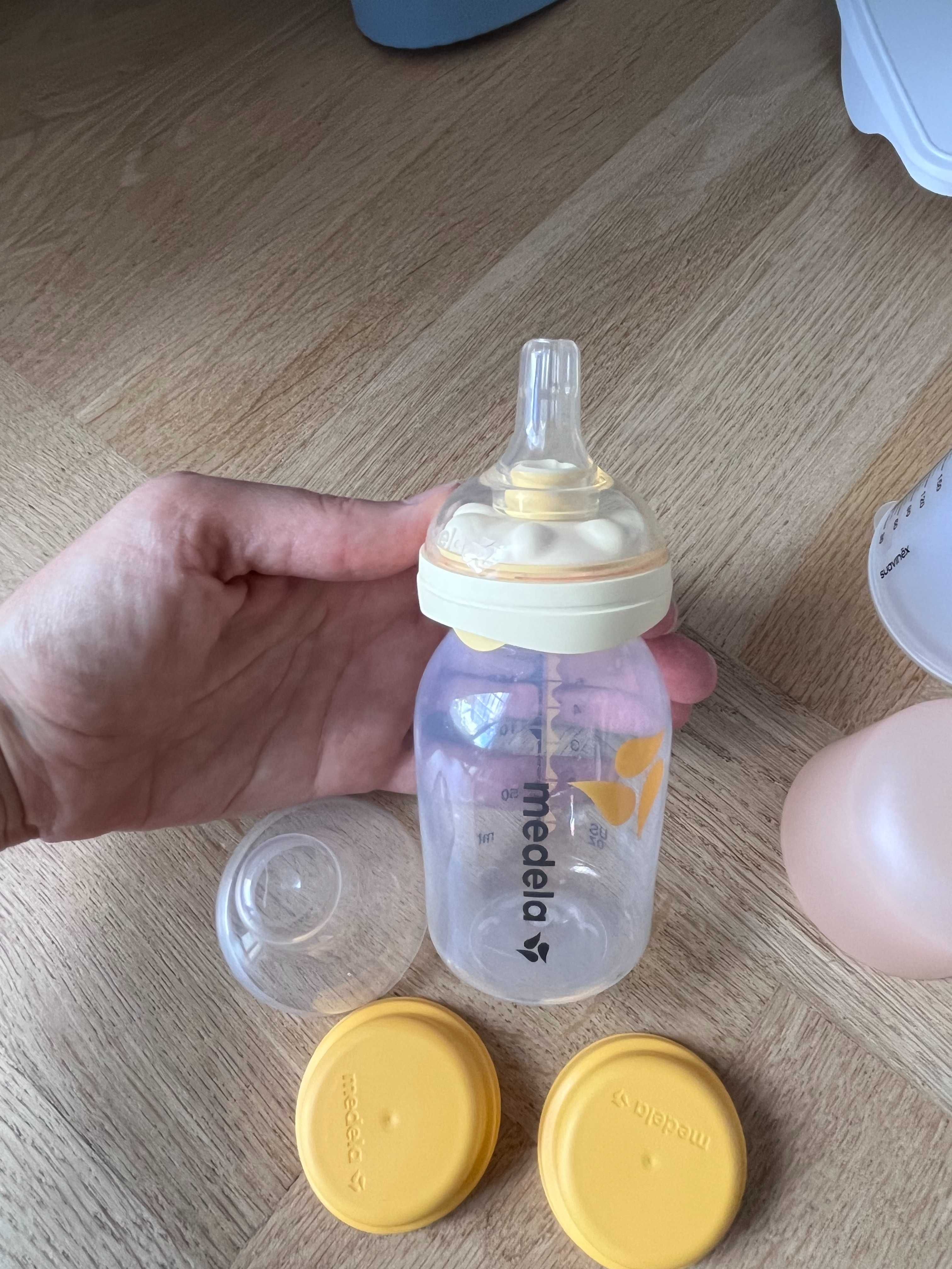 Bezprzewodowy laktator Bellababy + akcesoria do przechowywania mleka