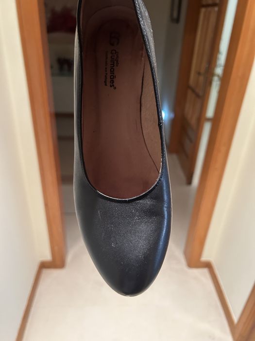 Sapatos de pele como novos