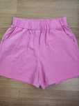 Calções rosa de menina
