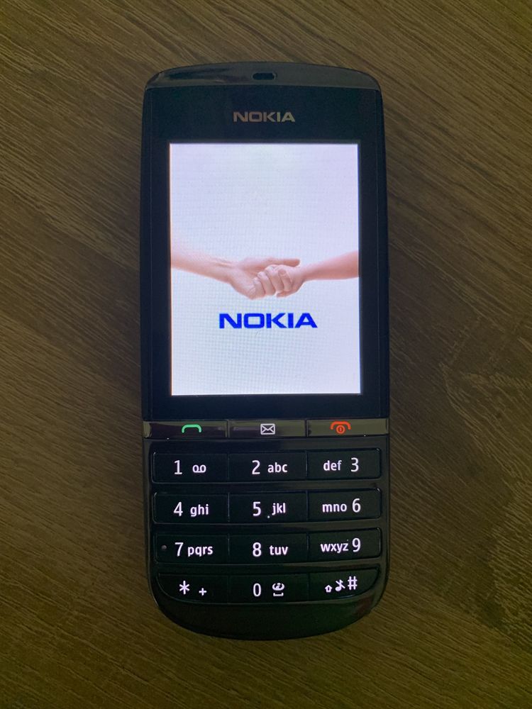 Nokia 203робочий  підтримує Укр сімку