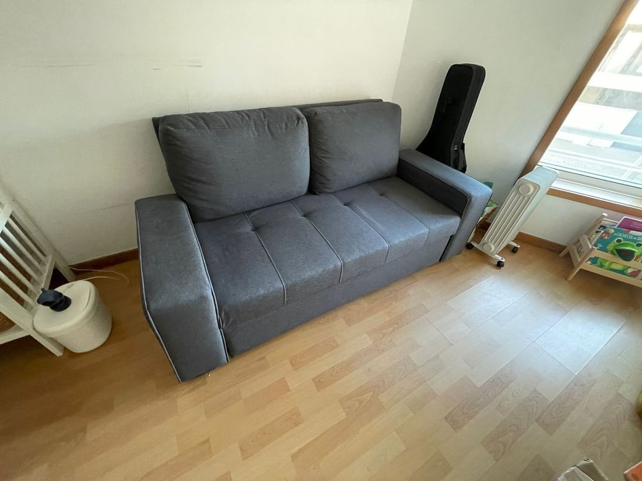 Sofá-cama cinzento