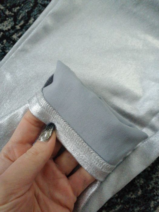 Nowe spodnie błyszczące legginsy