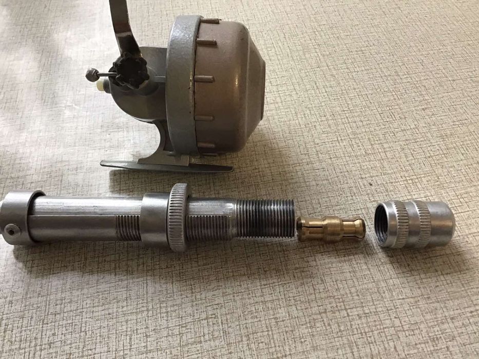 Спиненговый держатель катушки