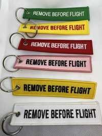 Porta chaves remove before flight