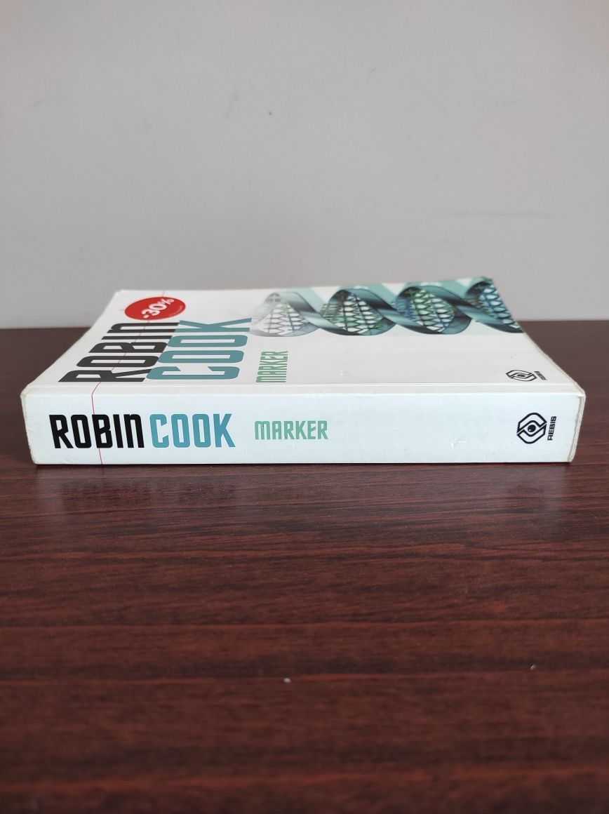 Książka Marker autor Robin Cook, oprawa miękka.

„Marker” to thriller
