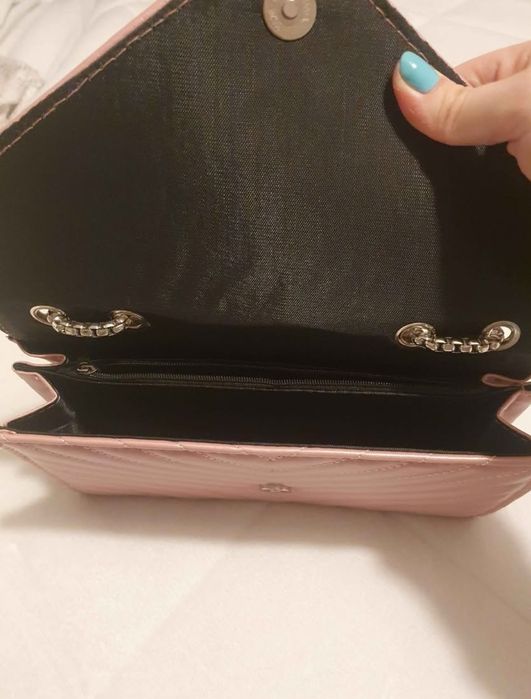 Mala tira colo rosa bebé