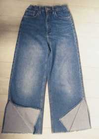 Широкие джинсы-клеш  стрейчевые с разрезами 10-13 лет рост 128-146 см