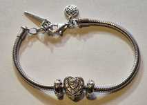 Apart nowa (nie używana) bransoletka damska + charms serce + 2 stopery