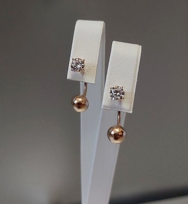 Оригінальні золоті сережки-джекети з яскравим цирконієм 585 проба нові