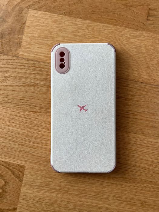 Capa de telemóvel iPhone X branca e rosa avião