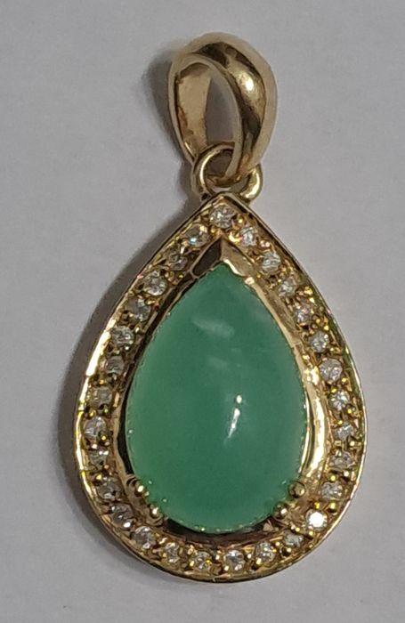 Zawieszka złota zbrylantami.