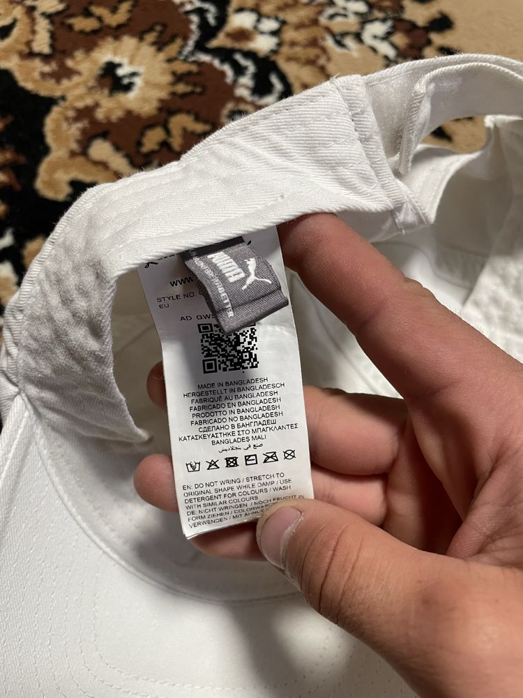 Кєпки Puma та Converse