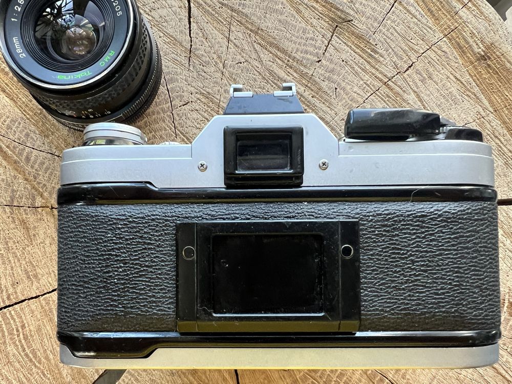 Canon AE-1 + Canon 50mm 1:1.8 + Tokina 28mm 1:2.8