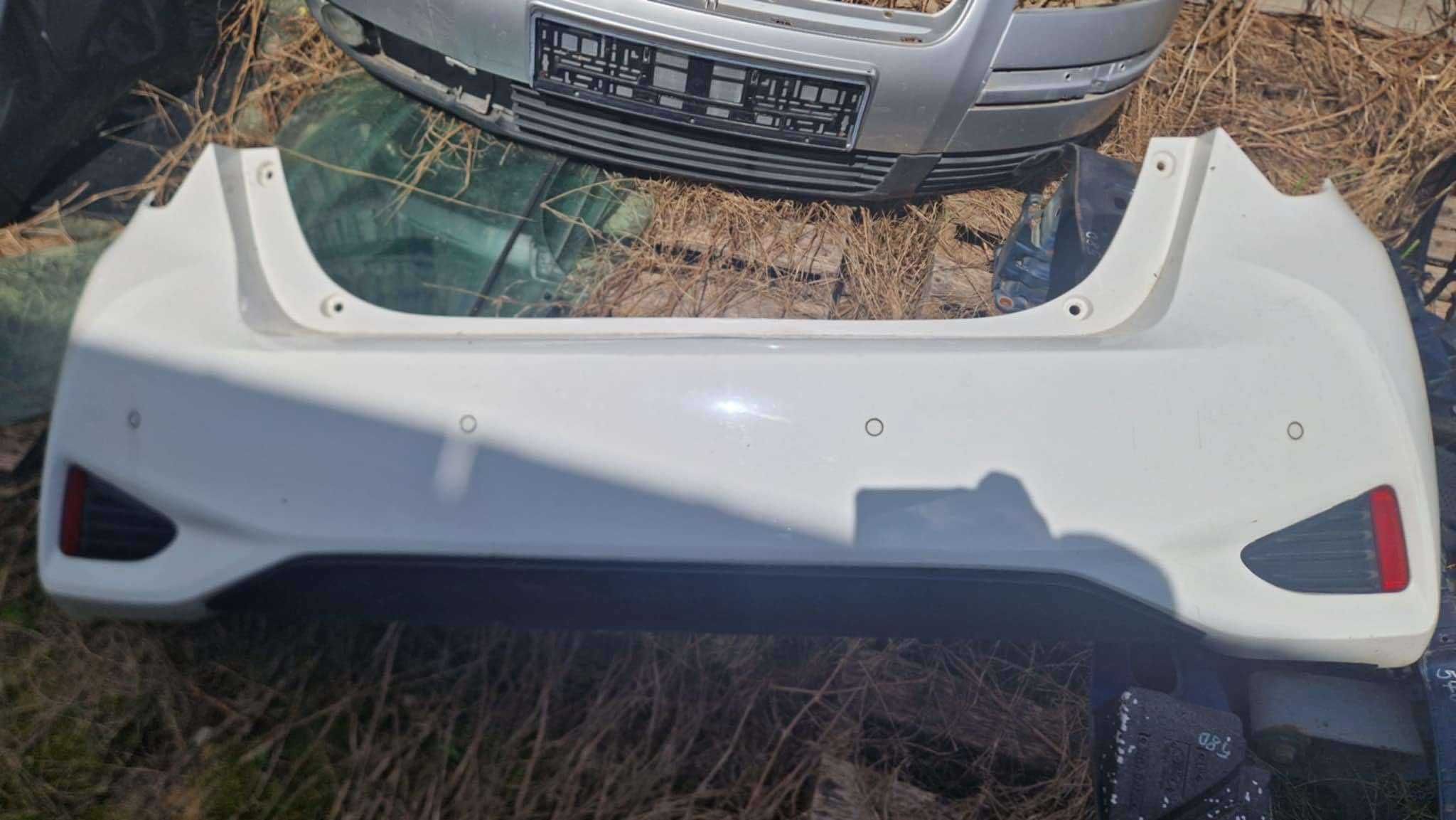 Zderzak tył toyota yaris III hybryda kolor 040