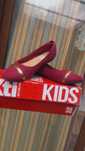 Sapatos novos criança