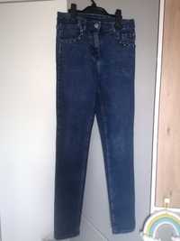 Spodnie jeansowe Coccodrillo r..152