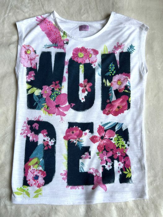 Biały t-shirt z nadrukiem dziewczęcy - rozm. 134