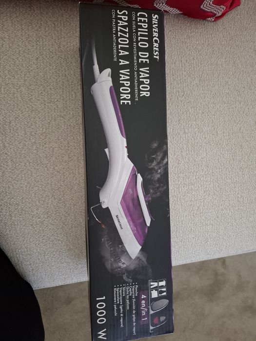Ferro de roupa a vapor