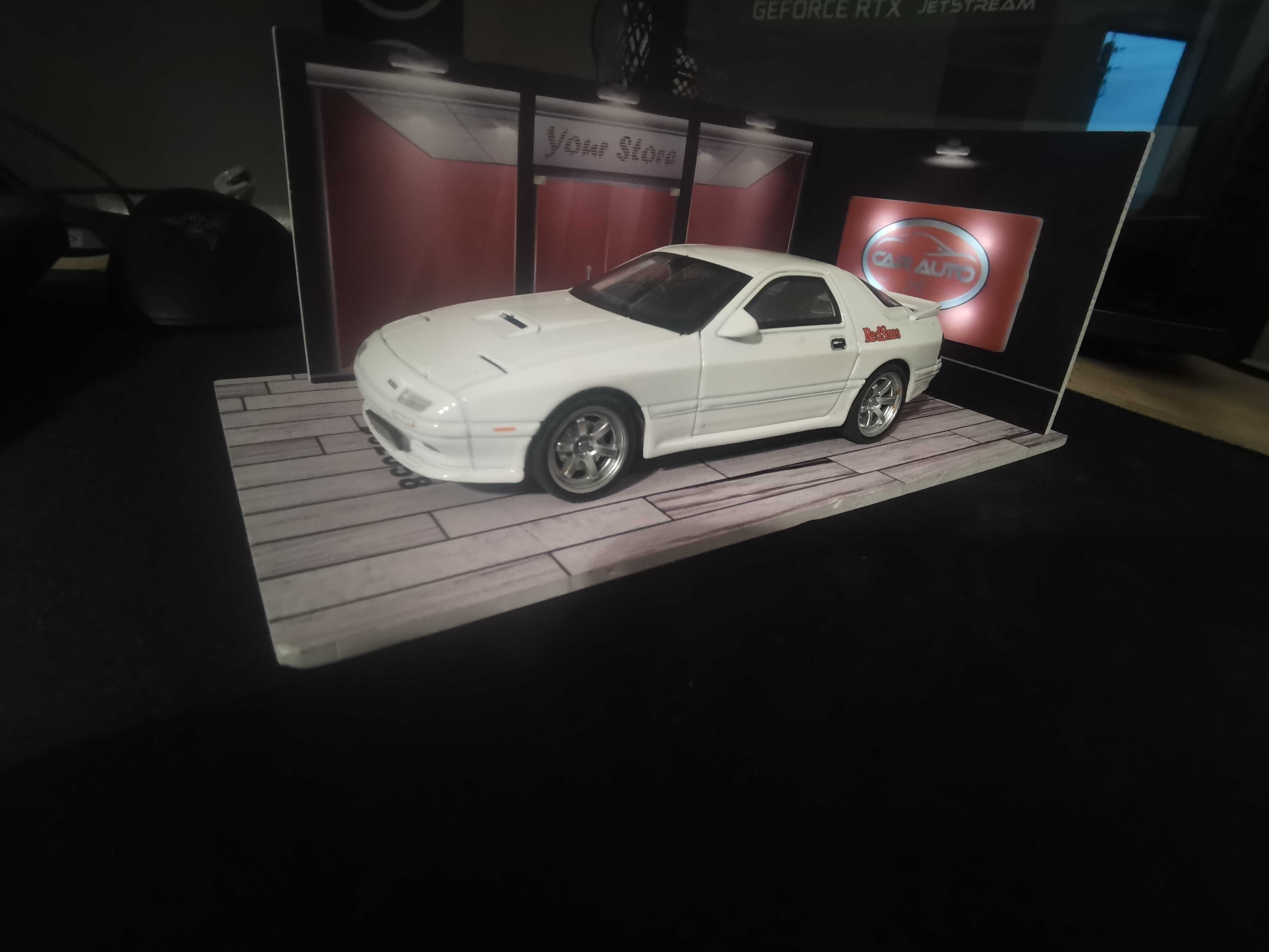 Auto zabawka Mazda dźwięki światła garaż