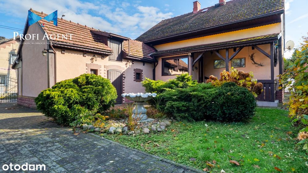 Przestrzeń do życia i oddechu – dom z garażem i zieloną działką