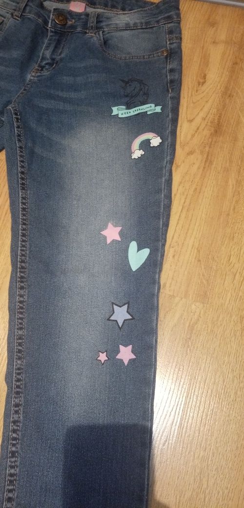 Spodnie jeansowe dla dziewczynki z jednorożcem jak nowe rozmiar 158