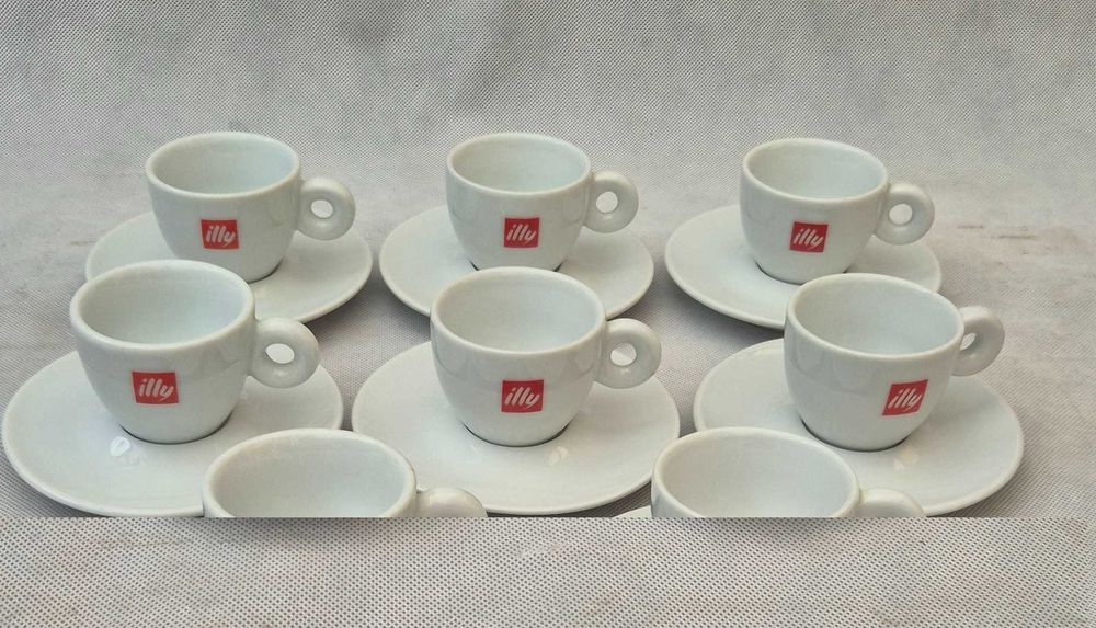 Zestaw oryginalnych filiżanek espresso ze spodkiem illy 6 sztuk Włochy