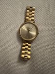 Relogio Nixon dourado