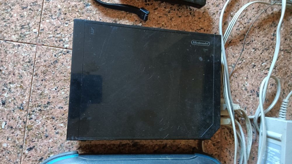 Wii com balança e um comando