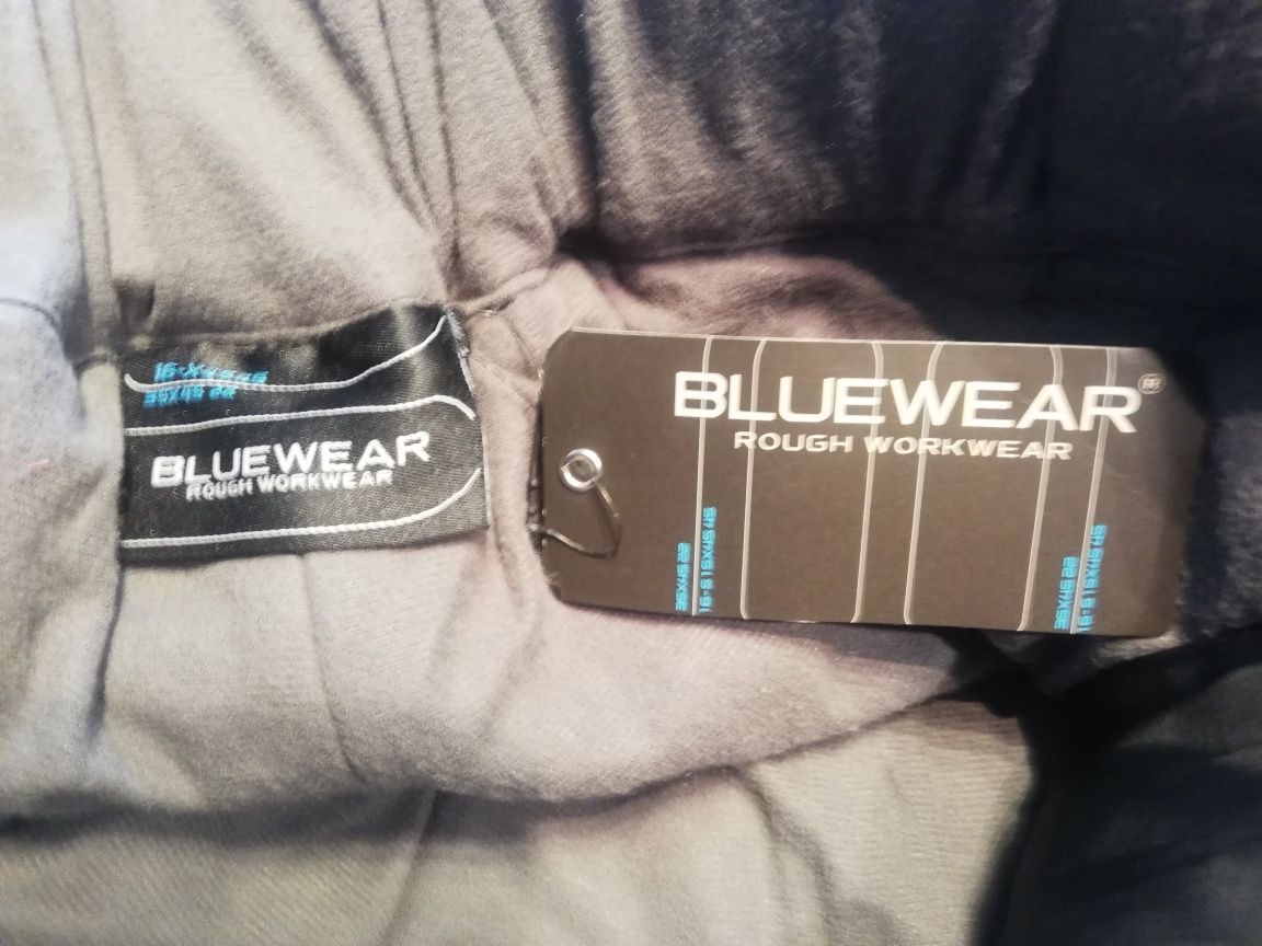 Nowe spodnie ocieplane Bluewear r.L z pasami śniegowymi  i membraną
