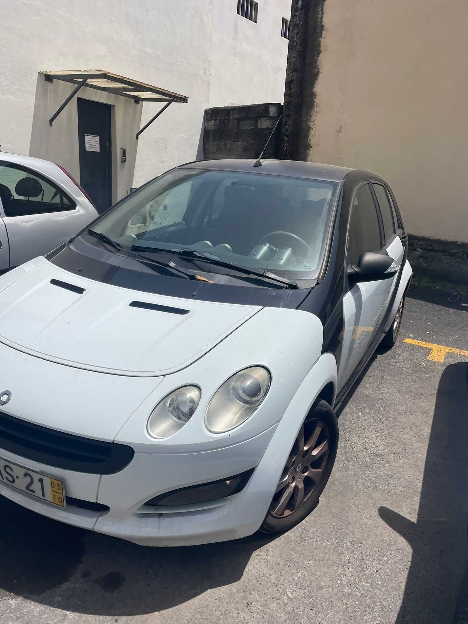 Vendi Smart inspeção até Novembro em bom estado ano 2005