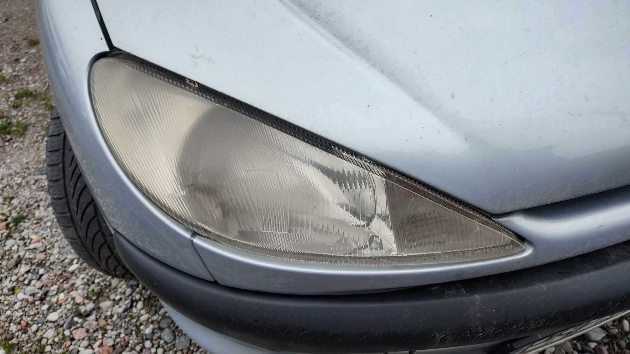 Reflektor lampa prawa przód przednia Peugeot 206 eu