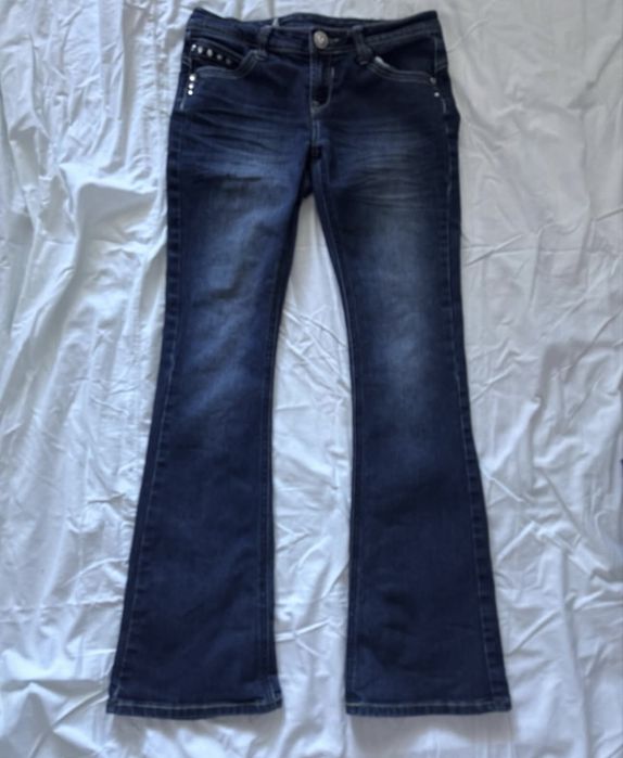 вінтажні кльош джинси на низькій посадці