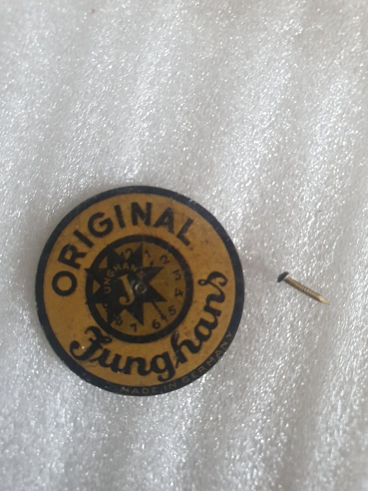 Junghans oryginalny znaczek metalowy antyk