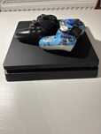 Ps 4 slim z dwoma padami + 9 gier