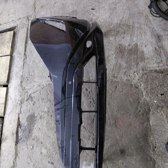 Бампер ніссан арія ліва частина