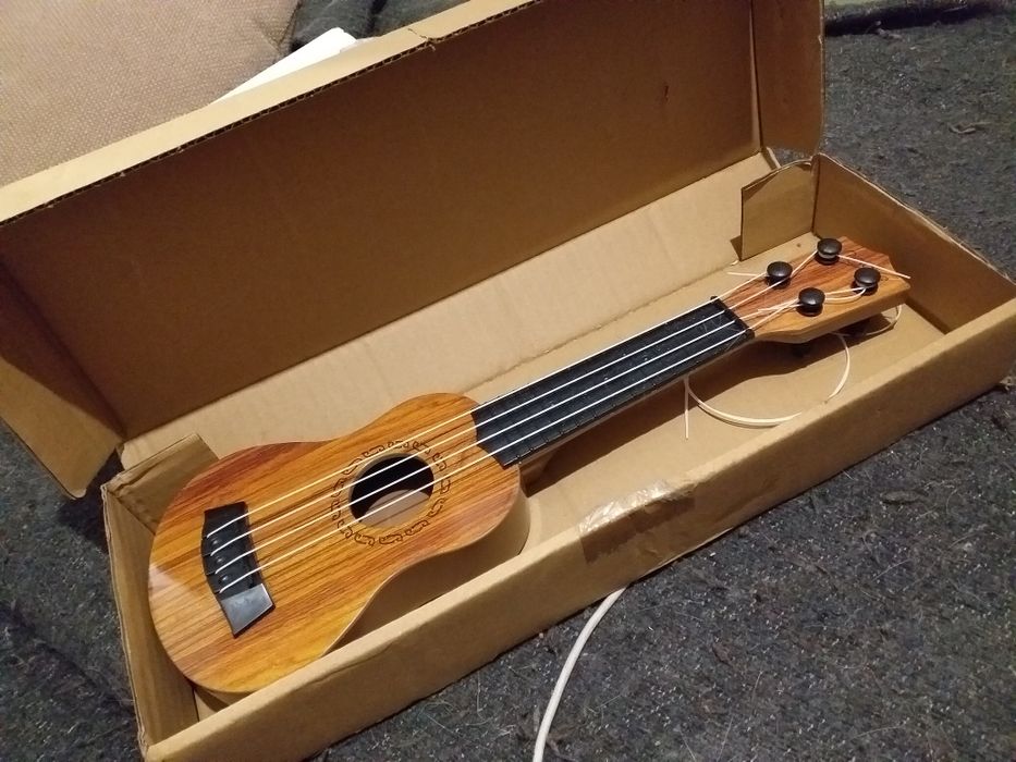 Używane zabawkowe ukulele instrumenty dla dzieci dodatkowe do struny