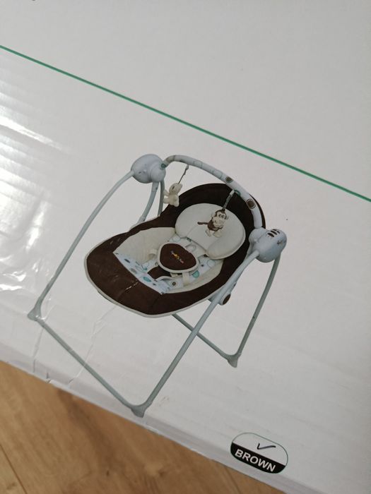 Bujaczek elektryczny leżaczek huśtawka niemowlęca Apollo Sun Nowa