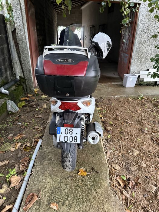 Vendo Aeon 125 C/capacete