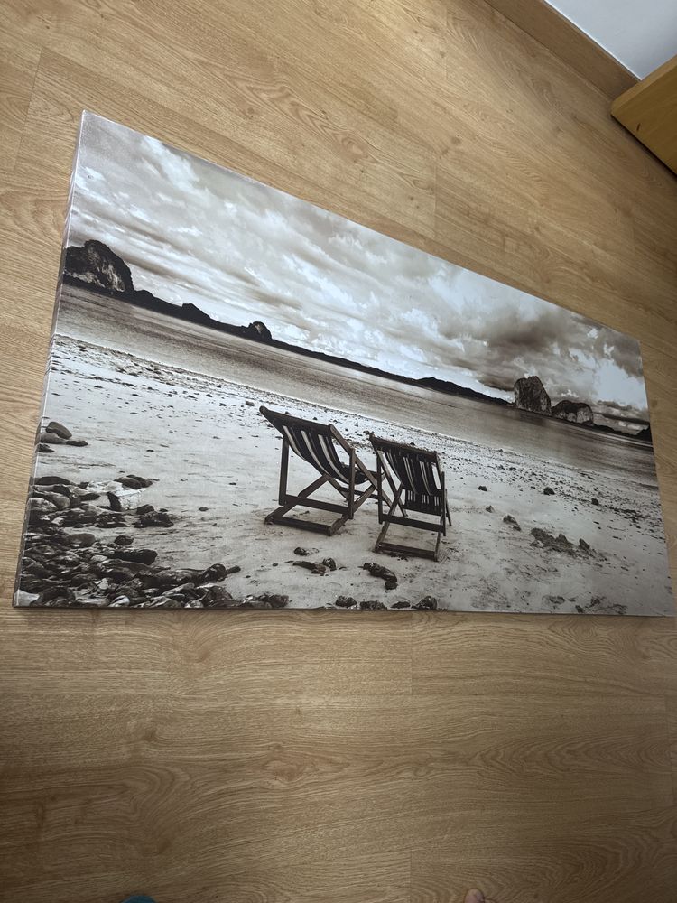 Quadro de praia com cadeira