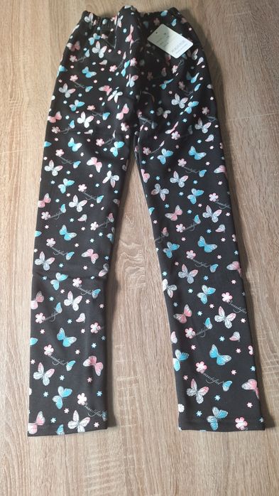 Leginsy ocieplane czarne z motylkami 152/158