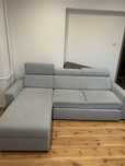 Szara sofa rozkładana narożnik rozkładany
