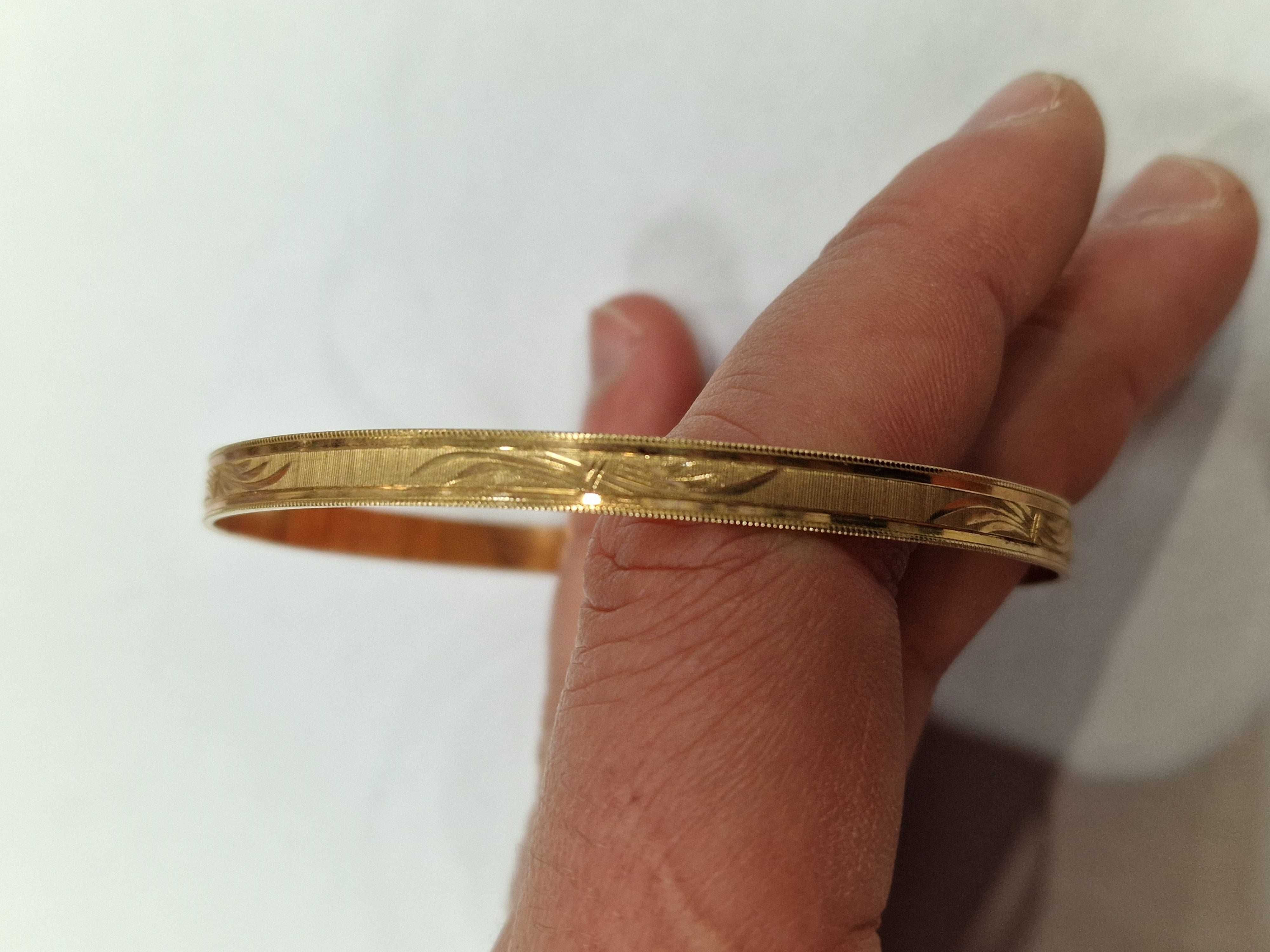 Złota bransoletka damska/ Sztywna/ Owalna/ 750/ 11.96 gram/ 1963-86