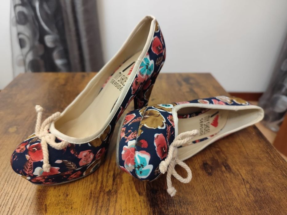 Sapatos praticamente sem uso