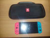 Nintendo Switch z akcesoriami i grą Pokemon