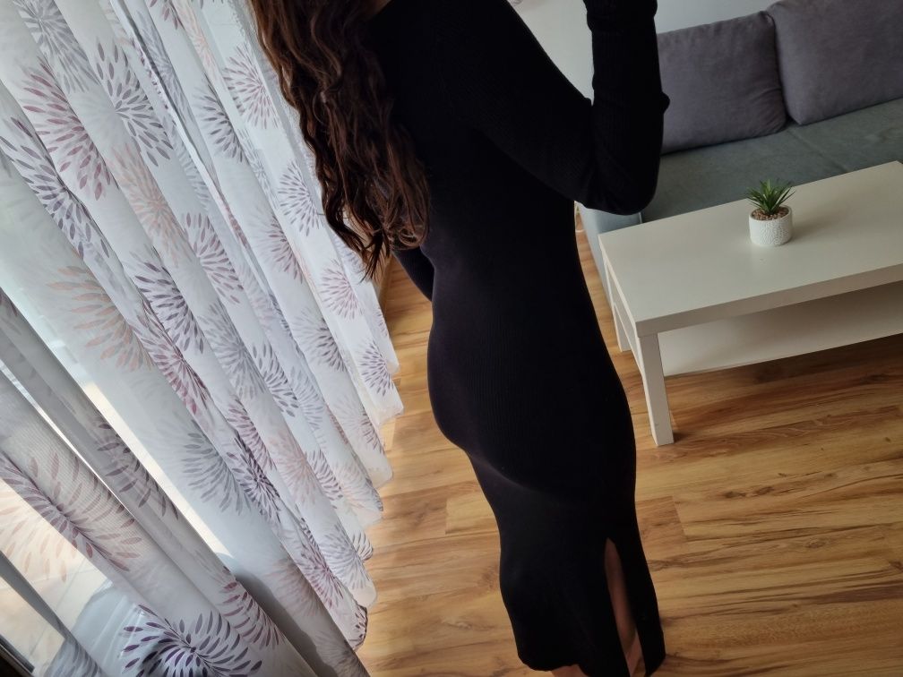 Nowa sweterkowa czarna sukienka midi z rozcięciem na długi rękaw r. S