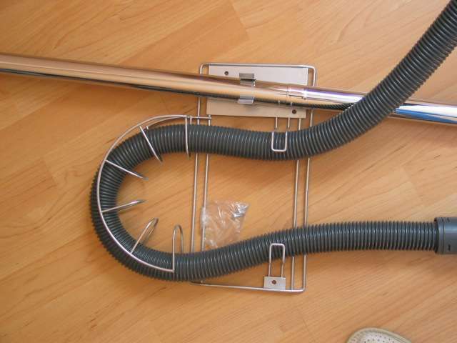 Uchwyt zmocowanie do szafy na rurę od odkurzacza nowe