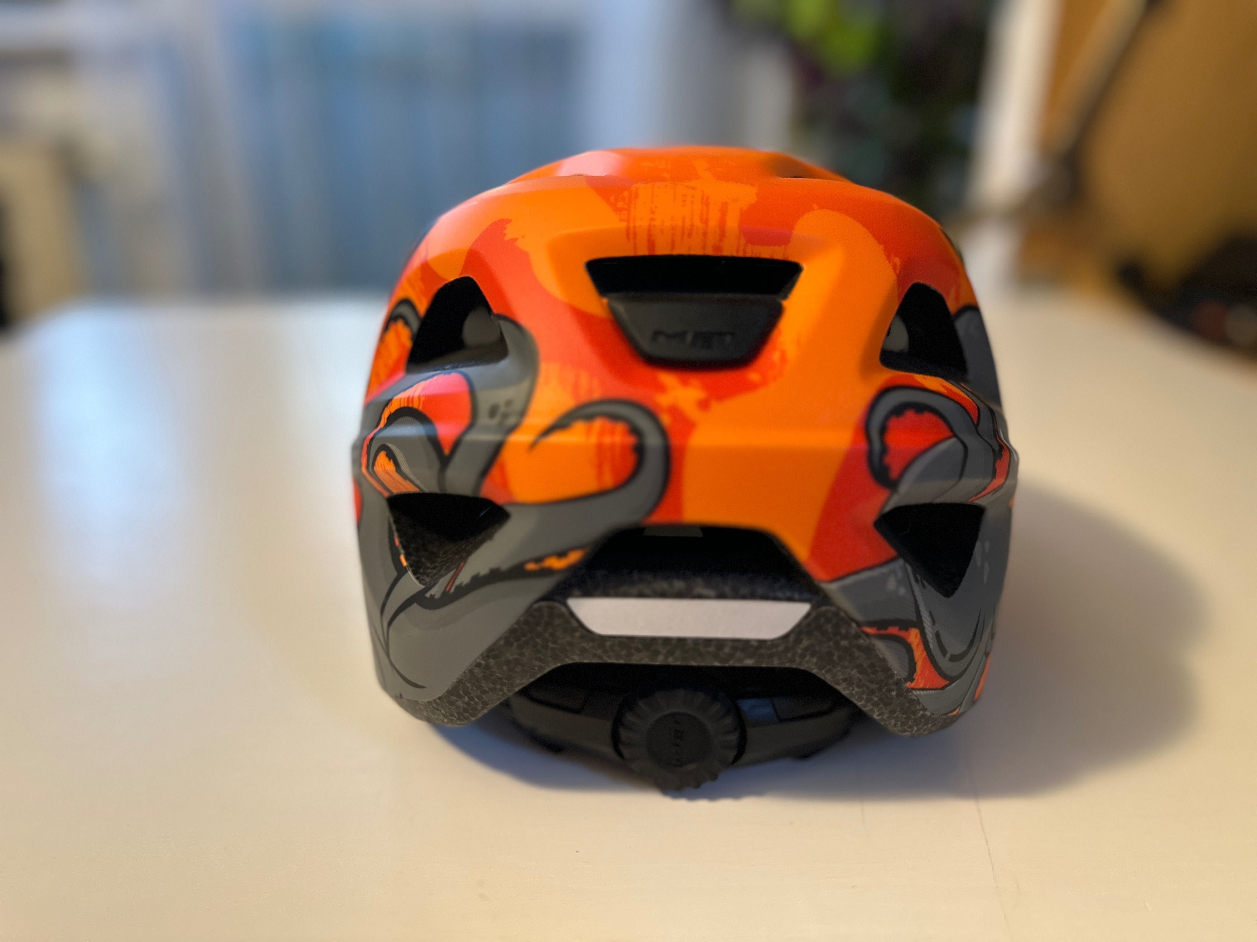 Kask rowerowy - super widoczny „pomarańcz” z ośmiornicą