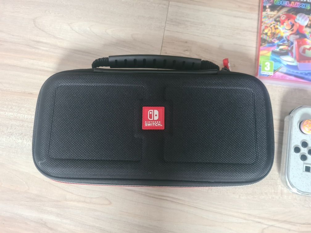 Nintendo switch oled+2etui+Pad 8bitdo+2joycony+ładowarka na 4joycony