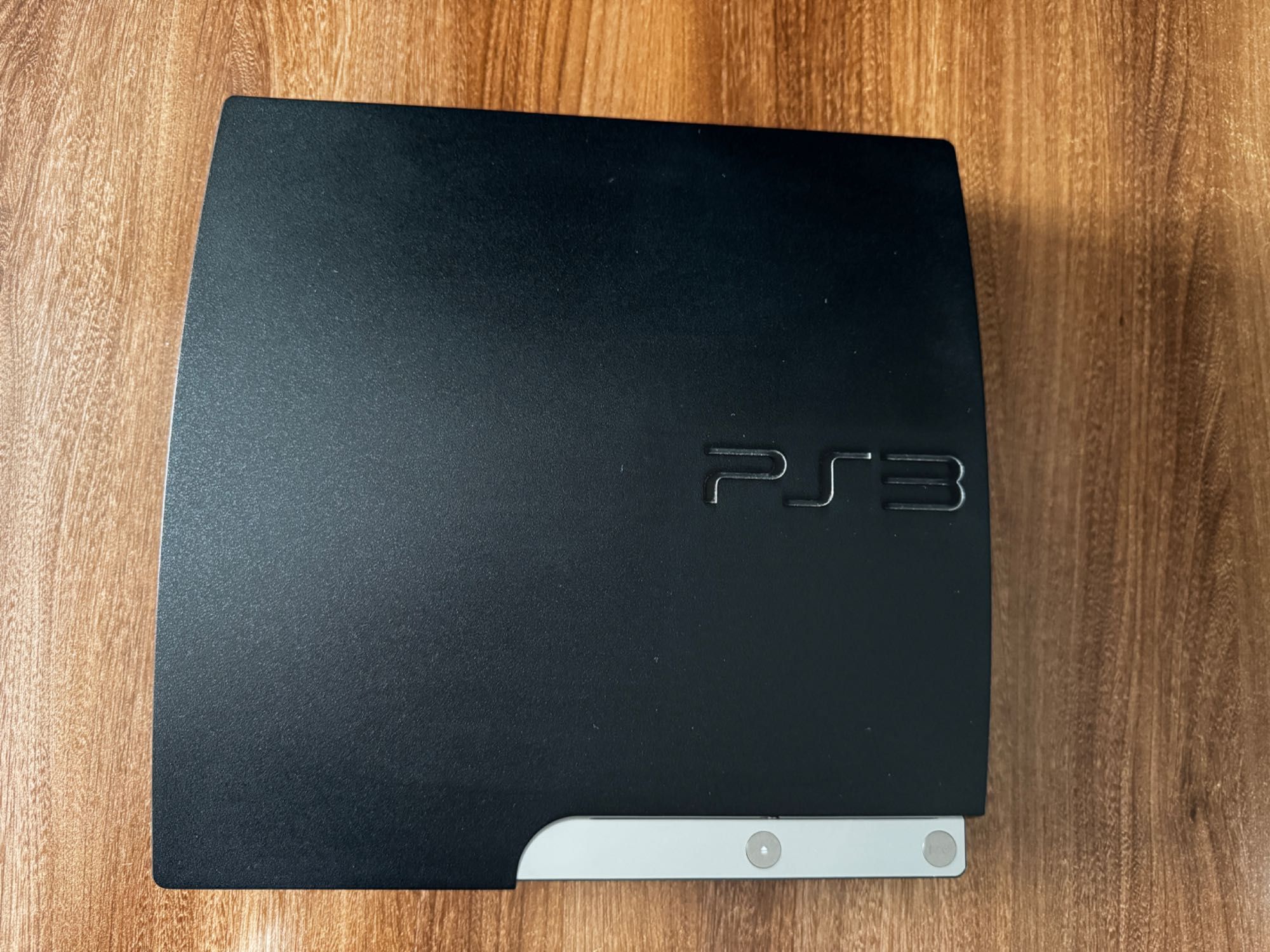 PSP3 slim PlayStation + 2 gry + pad                          JAK NOWA!