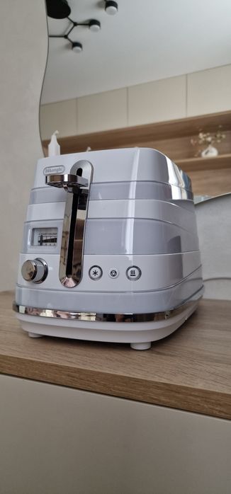 Продам тостер DeLonghi